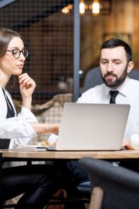 Business couple at the cafe